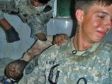 Новый скандал в США из-за Афганистана: солдаты фотографировались с частями тел смертников Новый скандал в США из-за Афганистана: солдаты фотографировались с частями тел смертников