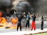 Акция протеста в Бахрейне, 22 апреля 2012 года Акция протеста в Бахрейне, 22 апреля 2012 года