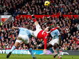 Гол нападающего "Манчестер Юнайтед" Уэйна Руни в ворота "Манчестер Сити", забитый ударом через себя 12 февраля 2011 года, был признан болельщиками лучшим голом в английской премьер-лиге за последние 20 лет