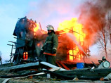 В Архангельске в субботу вечером в результате пожара сгорел дом известного бизнесмена Николая Сутягина - когда-то дом был самым высоким деревянным зданием в мире, но затем верхние этажи пришлось разобрать
