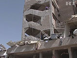 По предварительным данным, взорвались начиненные взрывчаткой автомобили, припаркованные у зданий спецслужб в районе аль-Каззаз