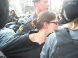 Новое ВИДЕО с "Марша миллионов": полицейский успокаивает женщину коленом в лицо