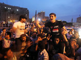 В Египте протестующие против участия в выборах экс-премьера Шафика подожгли его штаб