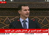 Асад пришел в сирийский парламент: страна должна противостоять кризису, а не бежать от него