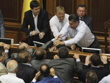 В правящей Партии регионов, возглавляемой президентом Виктором Януковичем, радуются: "Мы их (оппозицию в парламенте) развели, как котят"