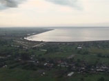 Пять жителей Крымска с вертолета убедились: "Сброс воды был технически невозможен"