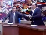 Иорданский депутат чуть не застрелил оппонента в прямом эфире (ВИДЕО) Иорданский депутат чуть не застрелил оппонента в прямом эфире (ВИДЕО)