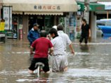 В Японии жертвами оползней и наводнений стали не менее 18 человек