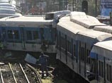 Поезд сошел с рельсов и загорелся в пригороде Каира Поезд сошел с рельсов и загорелся в пригороде Каира