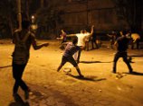 В Каире несколько сотен демонстрантов пытались захватить сирийское посольство В Каире несколько сотен демонстрантов пытались захватить сирийское посольство