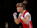 Наша спортсменка лидировала после исполнения рывка, но затем пропустила вперед выступающую за Казахстан китаянку Майю Манезу Наша спортсменка лидировала после исполнения рывка, но затем пропустила вперед выступающую за Казахстан китаянку Майю Манезу