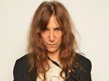 Патти Смит поддержала Pussy Riot, показав на концерте майку с надписью про Путина Патти Смит поддержала Pussy Riot, показав на концерте майку с надписью про Путина
