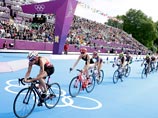 Швейцарка Никола Шпириг стала олимпийской чемпионкой, вырвав победу у шведки Лизы Норден на олимпийском турнире по триатлону. Третье время показала Эрин Деншам из Австралиии Швейцарка Никола Шпириг стала олимпийской чемпионкой, вырвав победу у шведки Лизы Норден на олимпийском турнире по триатлону. Третье время показала Эрин Деншам из Австралиии