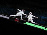 Российские шпажистки Виолетта Колобова, Любовь Шутова, Анна Сивкова и Татьяна Логунова остановились в шаге от бронзы олимпийского командного турнира, проиграв в матче за третье место американкам - 30:31 Российские шпажистки Виолетта Колобова, Любовь Шутова, Анна Сивкова и Татьяна Логунова остановились в шаге от бронзы олимпийского командного турнира, проиграв в матче за третье место американкам - 30:31