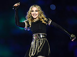Сегодня, 5 августа, в Москву приезжает американская певица Мадонна, которая даст единственный концерт в российской столице 7 августа в спорткомплексе "Олимпийский" и откроет собственный фитнес-клуб
