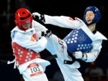 Китаянка выиграла олимпийское золото в тхэквондо в весе до 49 кг Китаянка выиграла олимпийское золото в тхэквондо в весе до 49 кг