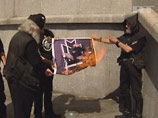 Хоругвеносцы изгнали бесов, предав огню постеры с Мадонной и участницами Pussy Riot