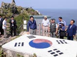 Президент Южной Кореи Ли Мен Бак на островах Токто, 10 августа 2012 года