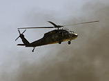 По меньшей мере, 11 человек погибли в результате падения вертолета Sikorsky UH-60 Black Hawk ("Черный ястреб") сил международной коалиции в провинции Кандагаре на юге Афганистана По меньшей мере, 11 человек погибли в результате падения вертолета Sikorsky UH-60 Black Hawk ("Черный ястреб") сил международной коалиции в провинции Кандагаре на юге Афганистана