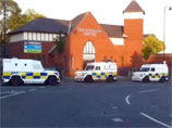 "Спусковым крючком" для новых массовых беспорядков в столице Северной Ирландии Белфасте, во время которых ранения получили по меньшей мере 26 полицейских, стало выступление лоялистских музыкантов из группы Republican Flute Bandу