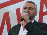 "Допрос занял чуть более трех часов, мы разговаривали о 58-секундном видеоролике, на котором запечатлено мое выступление со сцены на оппозиционном митинге на Болотной площади", - сообщил Фейгин "Допрос занял чуть более трех часов, мы разговаривали о 58-секундном видеоролике, на котором запечатлено мое выступление со сцены на оппозиционном митинге на Болотной площади", - сообщил Фейгин