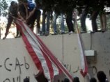 В Каире разбушевавшиеся салафиты и "ультрас" требуют выслать посла США и восхваляют бен Ладена