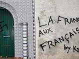 На дверях мечети во французском Леможе вандалы нарисовали знаки фекалиями