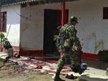 В Колумбии гангстеры наркомафии расстреляли на ферме девушку и девять мужчин В Колумбии гангстеры наркомафии расстреляли на ферме девушку и девять мужчин