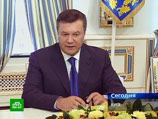 Янукович принял отставку всего украинского правительства Янукович принял отставку всего украинского правительства