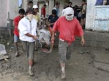 Наибольшее число погибших - 258 - зафиксировано на восточном побережье острова Минданао, на который два дня назад обрушилась стихия Наибольшее число погибших - 258 - зафиксировано на восточном побережье острова Минданао, на который два дня назад обрушилась стихия