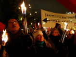 Противники присуждения Нобелевской премии мира Евросоюзу вышли с факелами на улицы Осло