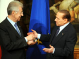 Марио Монти(на фото - слева) и Сильвио Берлускони