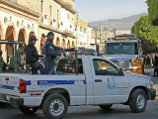 В одном из мексиканских храмов установили светофор, информирующий о криминогенной обстановке на улице
