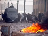 Египет в огне: на улицы Суэца вышли танки, президент покидает страну