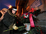 Петербуржцы возложили цветы к могилам Пискаревского кладбища в годовщину
снятия блокады