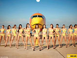 "Авиация - это сексуально". Тайская авиакомпания возмутила правительство календарем с полуголыми "стюардессами"