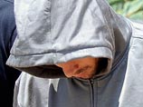 Южноафриканский легкоатлет Оскар Писториус утром 19 февраля прибыл в суд Претории на слушания по делу об убийстве своей подруги, модели Ривы Стенкамп