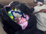 В Китае угонщик автомобиля задушил спавшего в салоне двухмесячного малыша