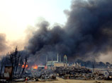 Толпа буддийских монахов сожгла в Мьянме три мечети, мусульманские лавки и магазины: двое погибших