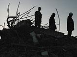 В Танзании рухнувшая высотка погребла под собой десятки человек - не менее 15 погибших