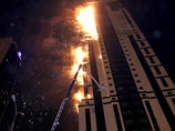 Напомним, что пожар в самой высокой башне Чечни "Олимп" вспыхнул вечером 3 апреля. Огонь охватил почти все этажи, в тушении участвовали сотни специалистов, на помощь прилетел вертолет МЧС из Минеральных Вод Напомним, что пожар в самой высокой башне Чечни "Олимп" вспыхнул вечером 3 апреля. Огонь охватил почти все этажи, в тушении участвовали сотни специалистов, на помощь прилетел вертолет МЧС из Минеральных Вод