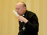 Полуголые "секстремистки" со святой водой атаковали бельгийского архиепископа (ФОТО)