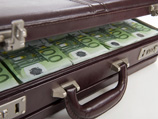 В Эстонии раскрыта крупнейшая афера по отмыванию денег. Наличные чемоданами вывозили в Россию