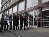 Центробанк Кипра доложил, кто больше всего потерял от "стрижки"