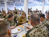 Ангела Меркель внезапно приехала в Афганистан, где неделю назад погиб немецкий солдат Ангела Меркель внезапно приехала в Афганистан, где неделю назад погиб немецкий солдат