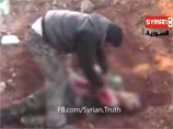 Основатель сирийской повстанческой "Бригады Омара аль-Фарука" Халид аль-Хамад, известный под прозвищем Абу-Саккар, заподозренный в поедании внутренних органов солдата правительственных войск, лично подтвердил, что именно он был запечатлен на скандальном в Основатель сирийской повстанческой "Бригады Омара аль-Фарука" Халид аль-Хамад, известный под прозвищем Абу-Саккар, заподозренный в поедании внутренних органов солдата правительственных войск, лично подтвердил, что именно он был запечатлен на скандальном в
