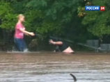 На юге американского штата Техас проливные дожди вызвали разлив рек и наводнение На юге американского штата Техас проливные дожди вызвали разлив рек и наводнение