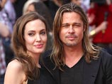 Голливудская звезда Анджелина Джоли и ее супруг Брэд Питт посетили в Лондоне премьеру фильма "World War Z", в котором Питт сыграл сотрудника ООН, который должен спасти человечество от "зомби-апокалипсиса"