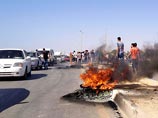 В ливийском городе Бенгази как минимум 28 человек погибли и не менее 60 получили ранения после того, как демонстрация у штаб-квартиры вооруженной группировки "Щит Ливии" встретила вооруженный отпор. Перестрелки продолжались много часов