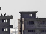 Вскоре после рассвета семеро вооруженных экстремистов захватили пятиэтажное строящееся здание, расположенное рядом с аэропортом, после чего открыли по нему огонь из автоматов, гранатометов, а также взорвали как минимум одну мощную бомбу Вскоре после рассвета семеро вооруженных экстремистов захватили пятиэтажное строящееся здание, расположенное рядом с аэропортом, после чего открыли по нему огонь из автоматов, гранатометов, а также взорвали как минимум одну мощную бомбу